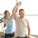 A man getting physical therapy treatment for his pain