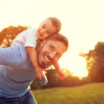 A man enjoying time with his son